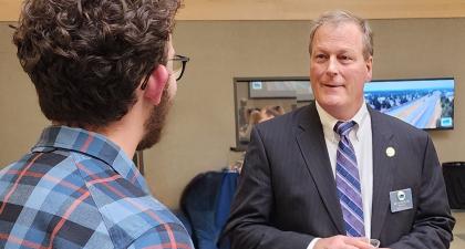 BRPELS Director, Ken Fuller, PE talks with a student