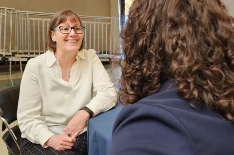 BRPELS Board Member, Maureen Jackson, PE talks with a student