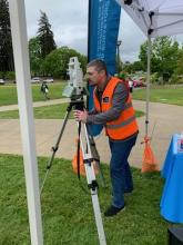 surveyor at booth